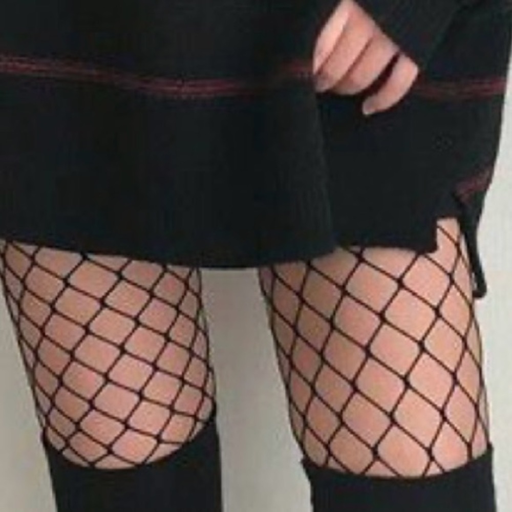 Hold Fishnet stockings